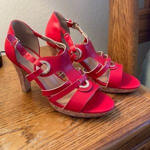 Red shoes with gold accents